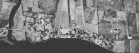 Old aerial photo of the village of Dickinson’s Landing  circa late 1940s. On the left is Hoople’s Creek, almost centered is Upper Wales rd., and Lower Wales rd. near the right side of the photo.